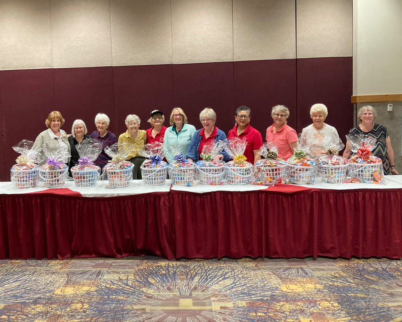 Chelan-Douglas members preparing treat baskets for first responders, May 2025..