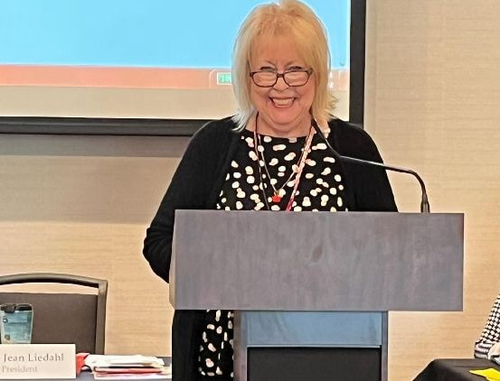 Carolyn Williams giving the Public Relations and Legislative report at the Spring BOD 2022.