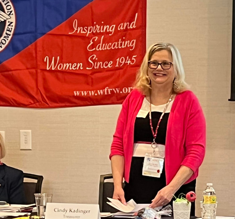 WFRW Treasurer Cindy Kadinger giving her report