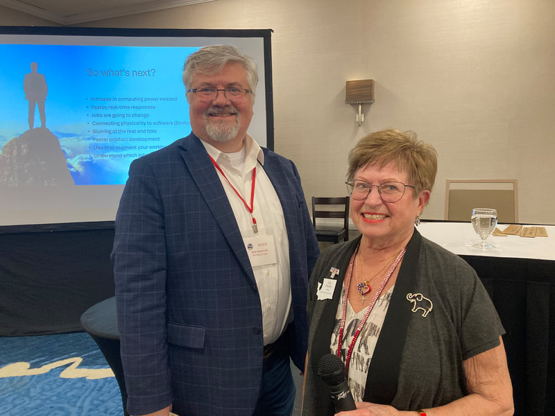 Mark Harnsworth spoke on Artificial Intelligence. Seen with President Ellie.