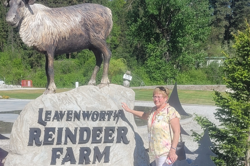 President Ellie Ownbey at the Reindeer Farm.
